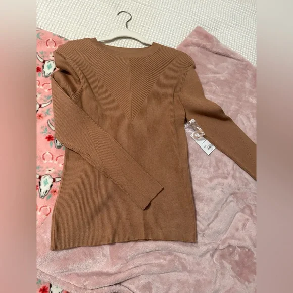 Nine West Tan Ribbed Sweater
Brand new with tags!
Size Large - Picture 2 of 9